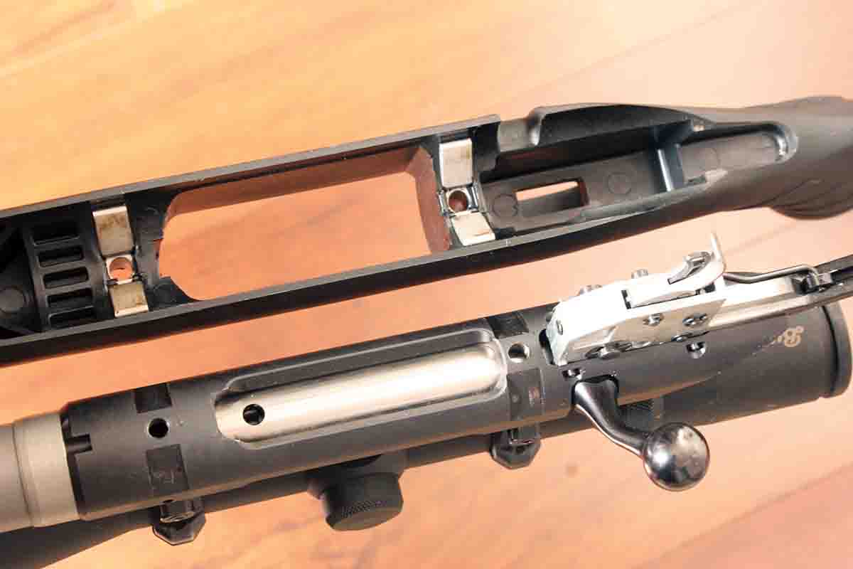 The Ruger American Rifle’s action has no recoil lug. Instead, the stock has a pair of imbedded V-blocks with shallow slots milled in the action to fit the blocks. This results in very fine accuracy.